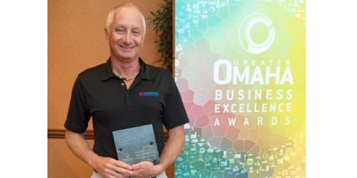 Greg Petersen, co-owner of CARSTAR Silver Hammer and CARSTAR Northwest, was recognized as a 2015 Greater Omaha Business Excellence Award winner.