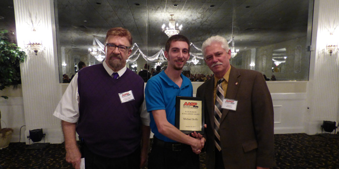  AASP/NJ Executive Director Charles Bryant [left] and President Jeff McDowell [right] with the scholarship recipient, Michael Boffo of Elmer's Auto Body, Inc.
