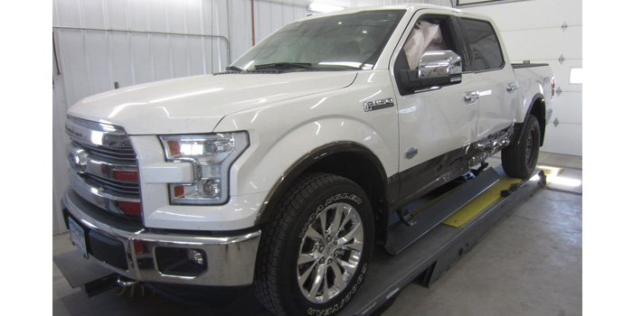 One of the damaged 2015 Ford F-150s that came to Carlson's Collision & Glass. Time to learn and earn!